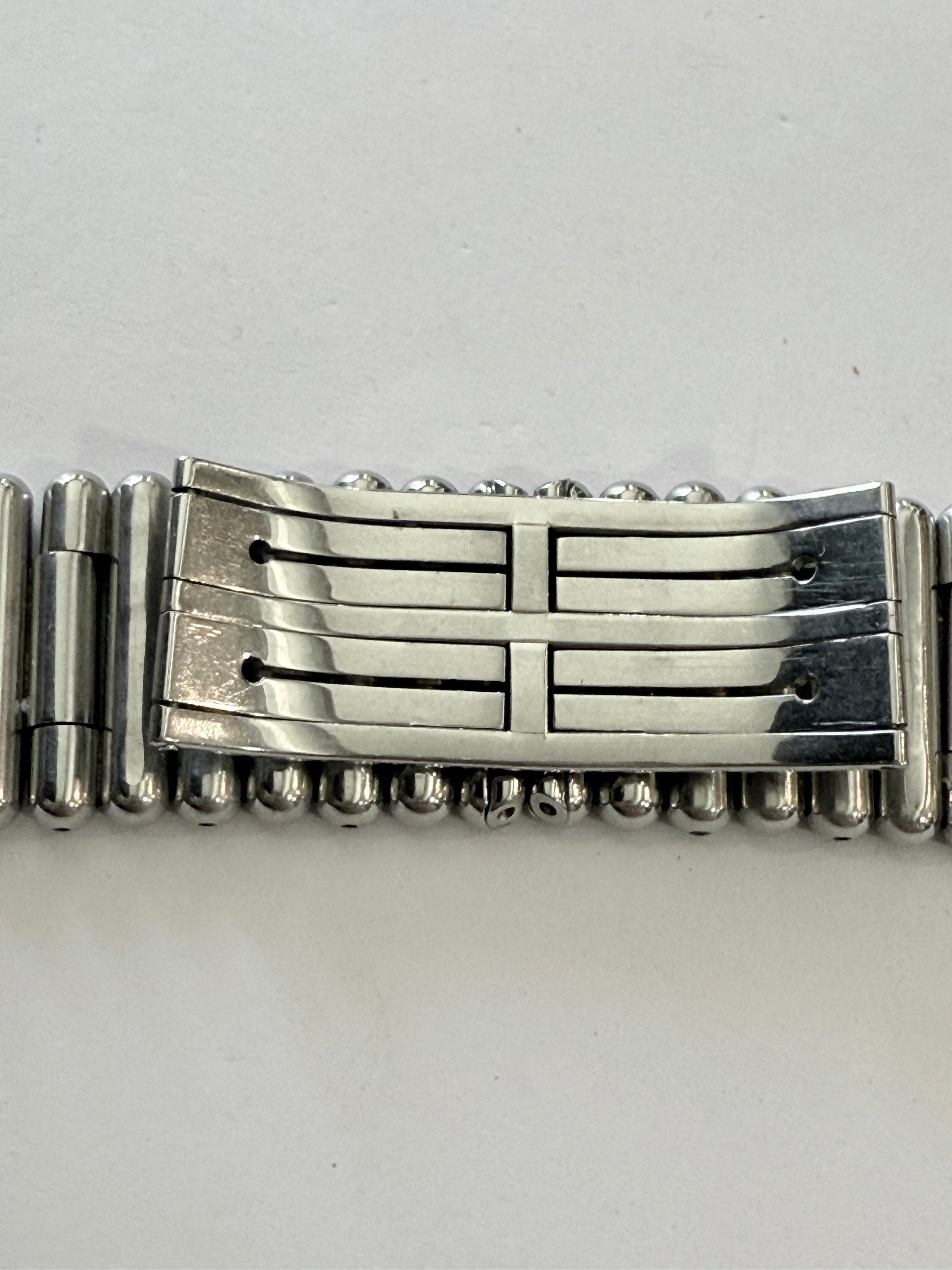 Breitling Rouleaux Bracelet 20mm Breitling Rouleaux (Bullet-Style) width, with authentic Breitling logo visible under magnification. Excellent condition and fully genuine.