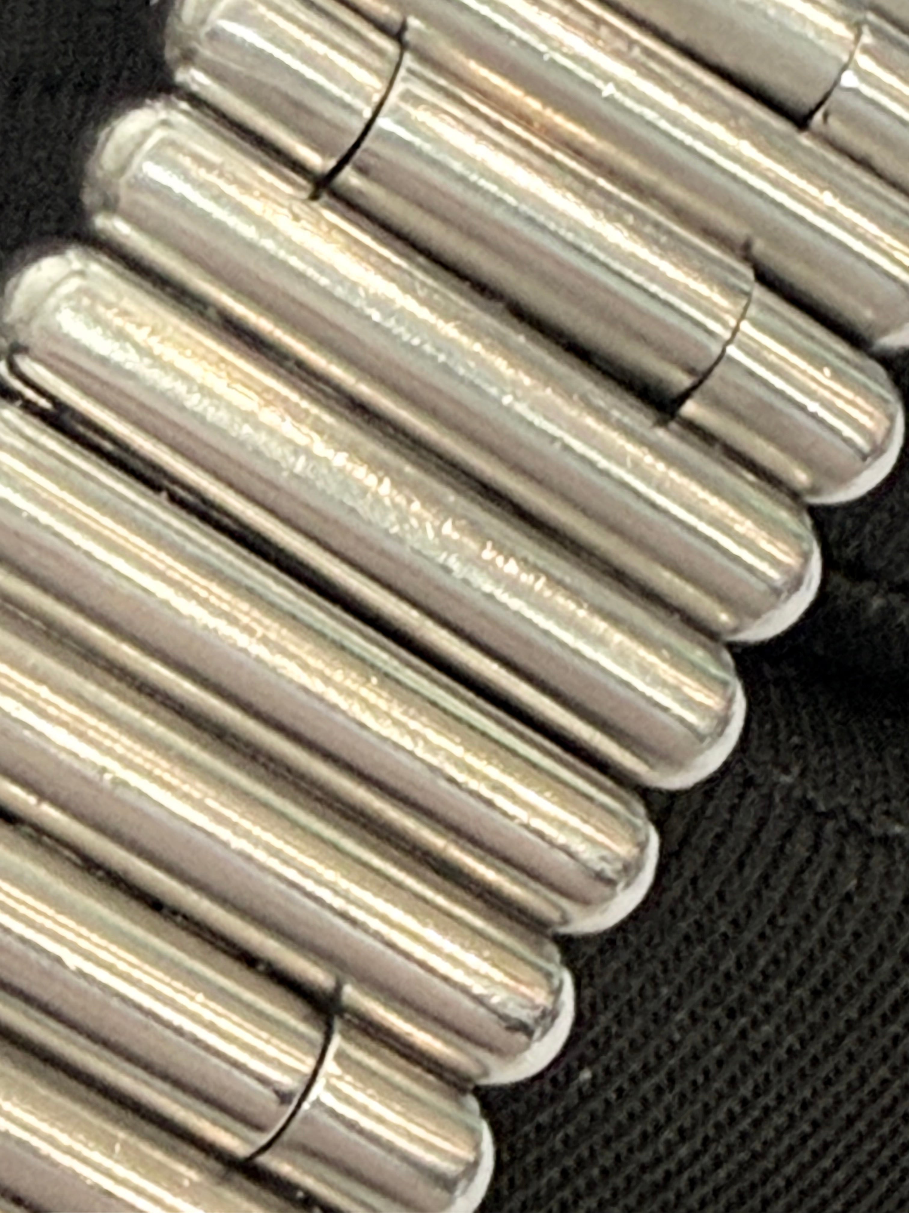 Breitling Rouleaux Bracelet 20mm Breitling Rouleaux (Bullet-Style) width, with authentic Breitling logo visible under magnification. Excellent condition and fully genuine.