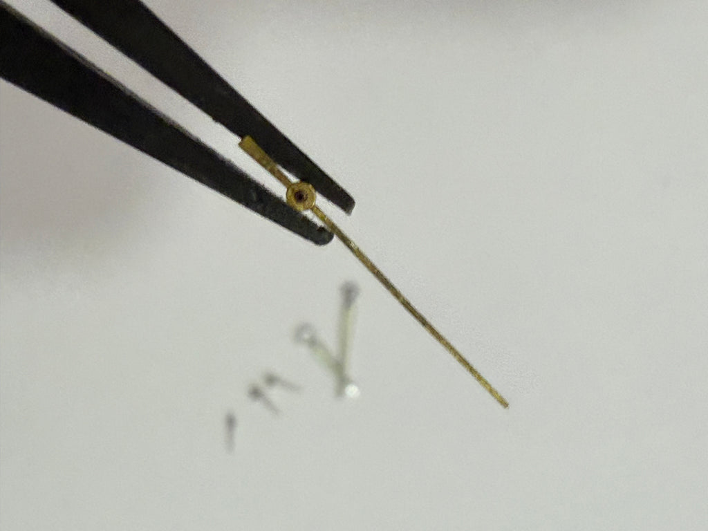 Original Zenith El Primero hands set for Caliber 400. All hands are in very good condition with no damage, except the central chronograph hand which has lost its silver plating. Fully original Zenith parts and a perfect fit for the same El Primero case an