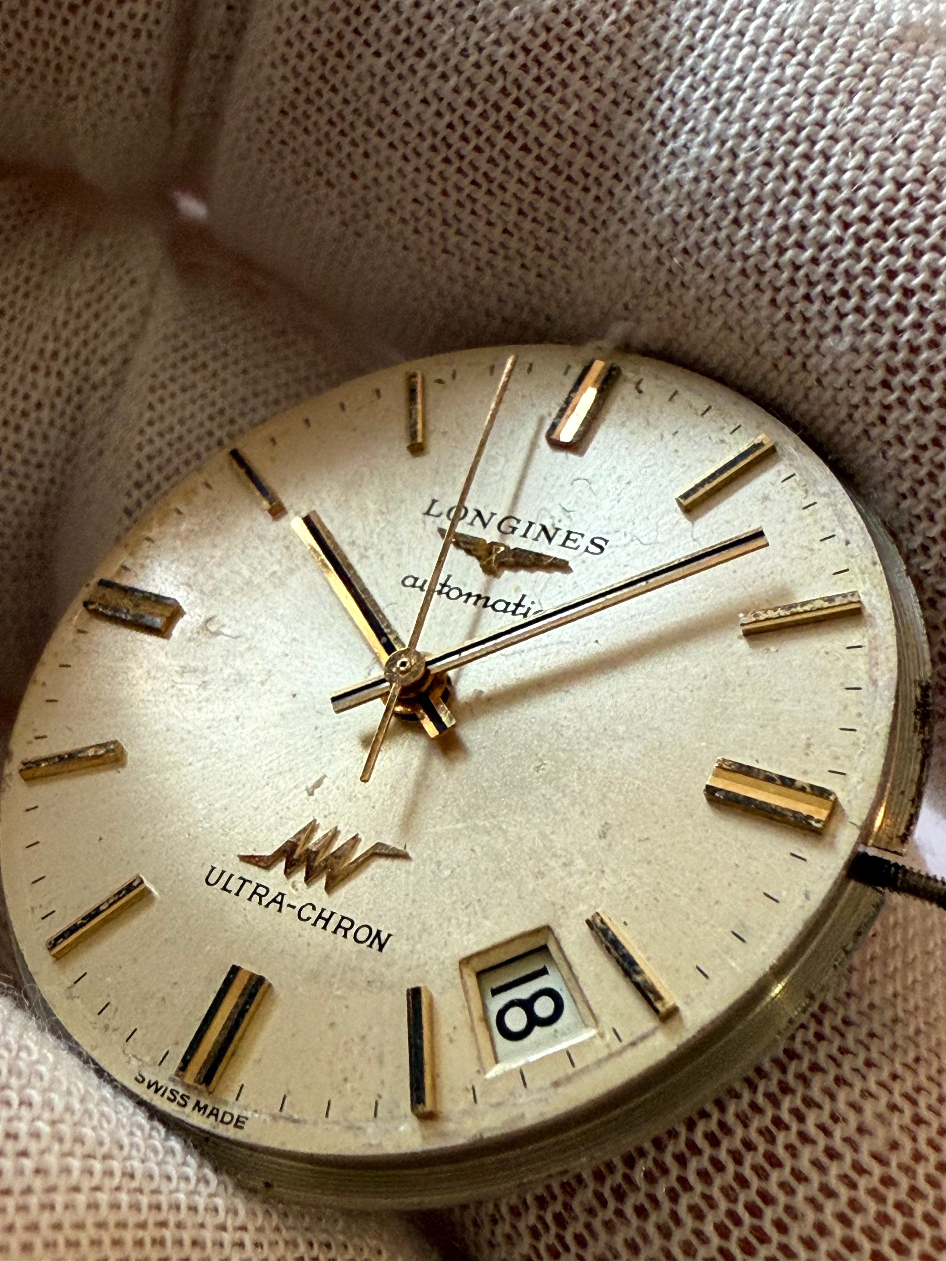 Original Longines Ultra-Chron automatic movement, Caliber 431 (36,000 vph), fully complete and serviced. Works perfectly. Original 18K Longines crown included. Dial has very light, natural aging spots (not damage). Date function works and advances correct