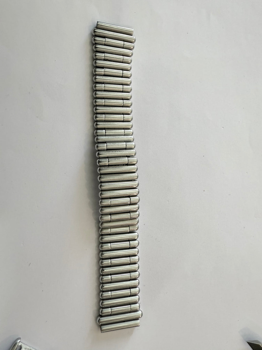 Breitling Rouleaux Bracelet 20mm Breitling Rouleaux (Bullet-Style) width, with authentic Breitling logo visible under magnification. Excellent condition and fully genuine.