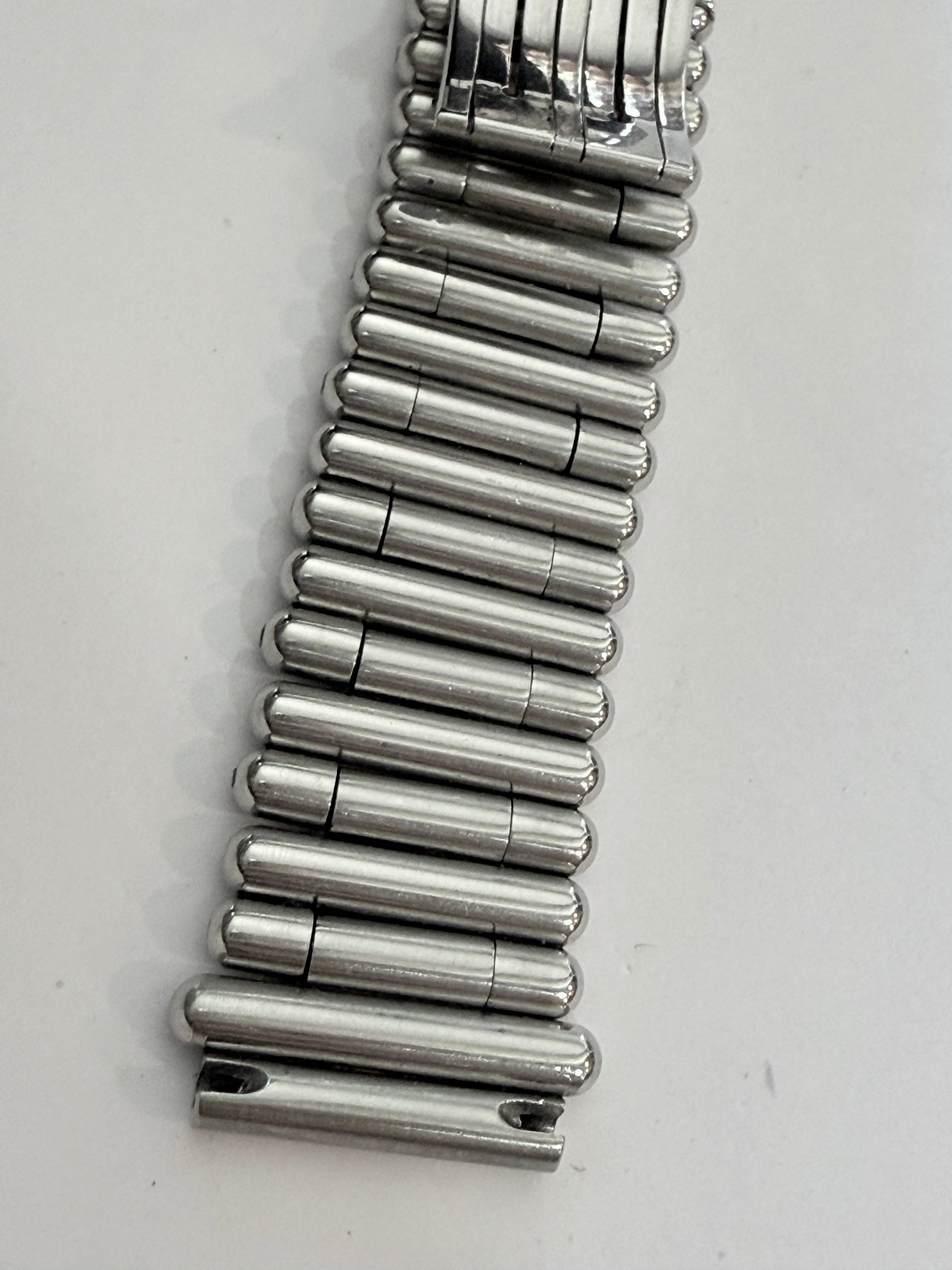 Breitling Rouleaux Bracelet 20mm Breitling Rouleaux (Bullet-Style) width, with authentic Breitling logo visible under magnification. Excellent condition and fully genuine.