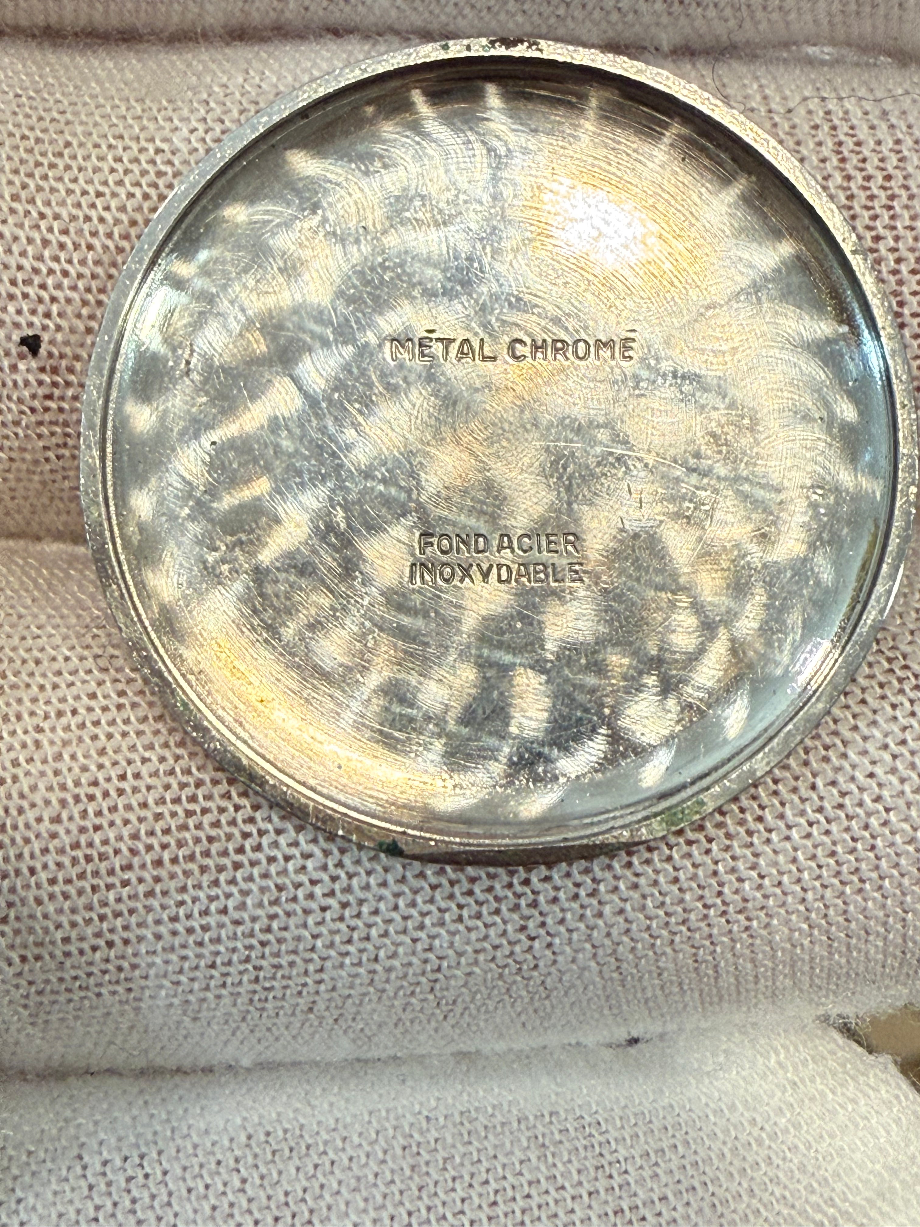 Vintage Revue Swiss wristwatch from the 1940s–1950s featuring the Revue Cal. 07 hand-wound movement, 33mm case, original dial with Roman numerals, and natural patina. Fully functional and stamped with reference number 3168133.